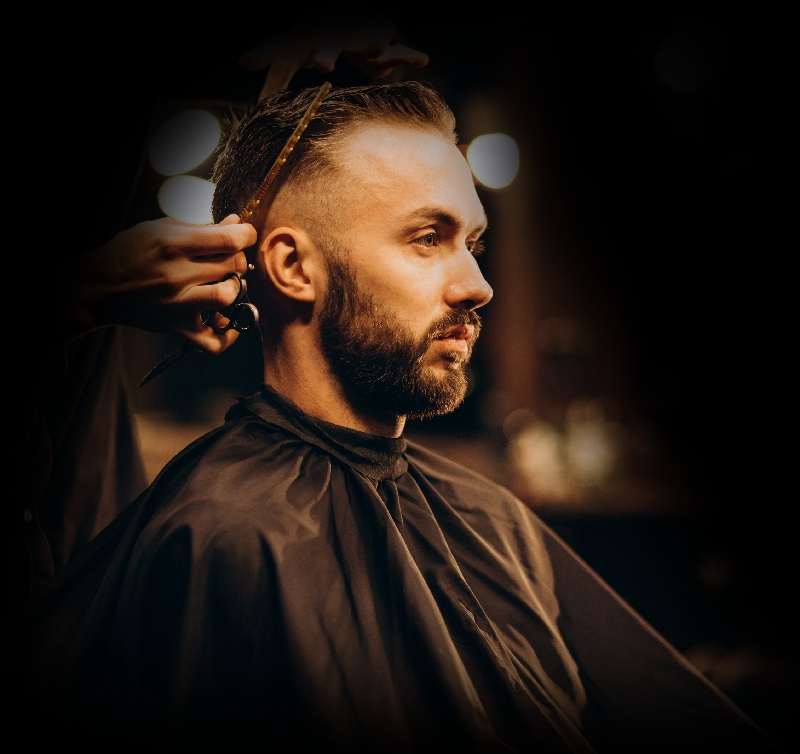 young man barbershop trimming hair 1